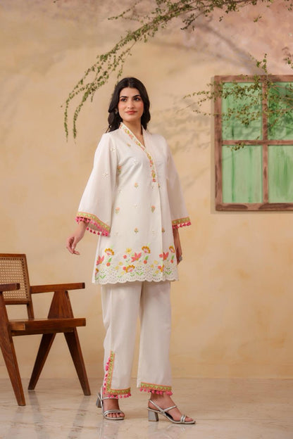 Nikhaar  – White Cotton Coord Set with Multicolour Floral Embroidery & Pink Tassel Trim | Casual Festive & Eid Ethnic Wear for Women