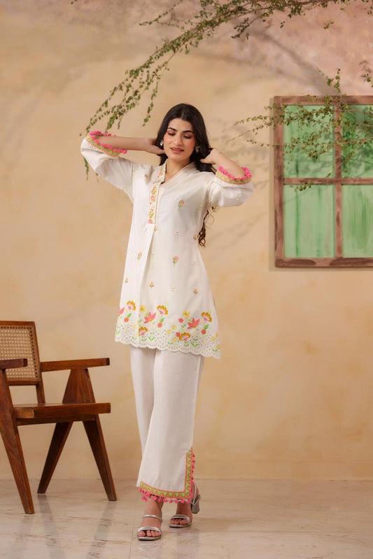 Nikhaar  – White Cotton Coord Set with Multicolour Floral Embroidery & Pink Tassel Trim | Casual Festive & Eid Ethnic Wear for Women